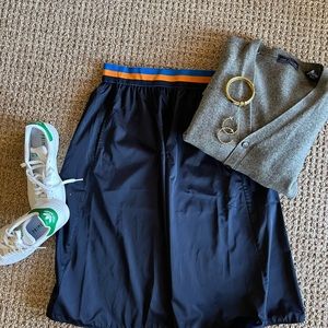 TORY BURCH SPORT, Navy sateen skirt in MEDIUM.